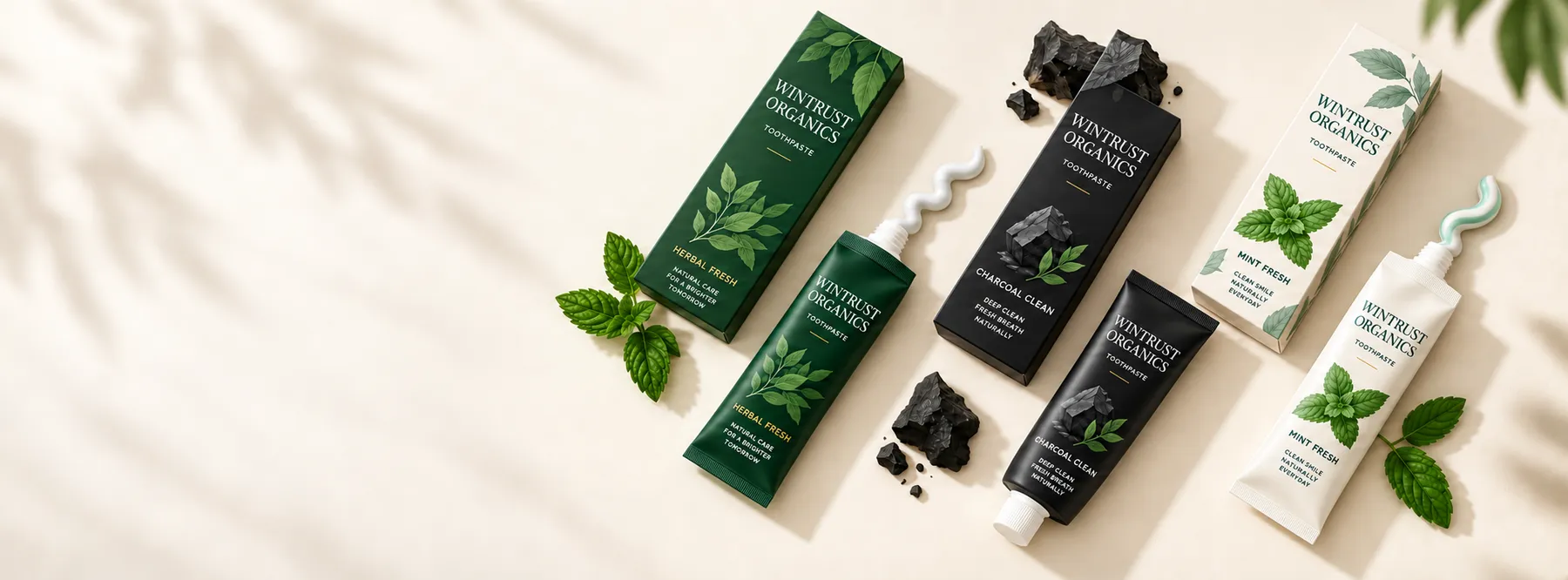 Wintrust Organics herbal, charcoal, and mint toothpaste tubes